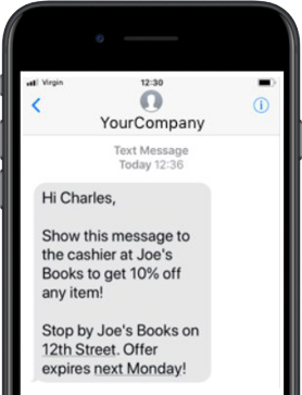 Text message on a smartphone offering a 10% discount at Joe's Books with a deadline for the offer.